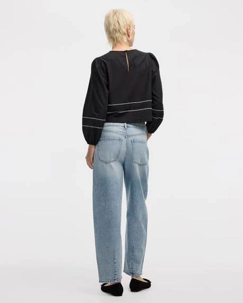 Blouse à col rond et manches longues bouffantes
