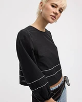 Blouse à col rond et manches longues bouffantes