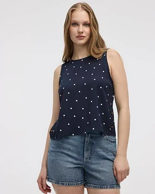 Blouse sans manches courtes avec boutons sur les côtés