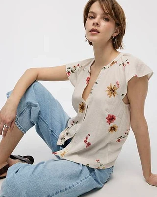 Blouse boutonnée à manches courtes volants et col fendu