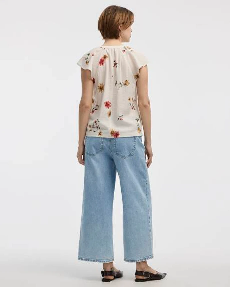 Blouse boutonnée à manches courtes volants et col fendu