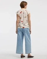 Blouse boutonnée à manches courtes volants et col fendu