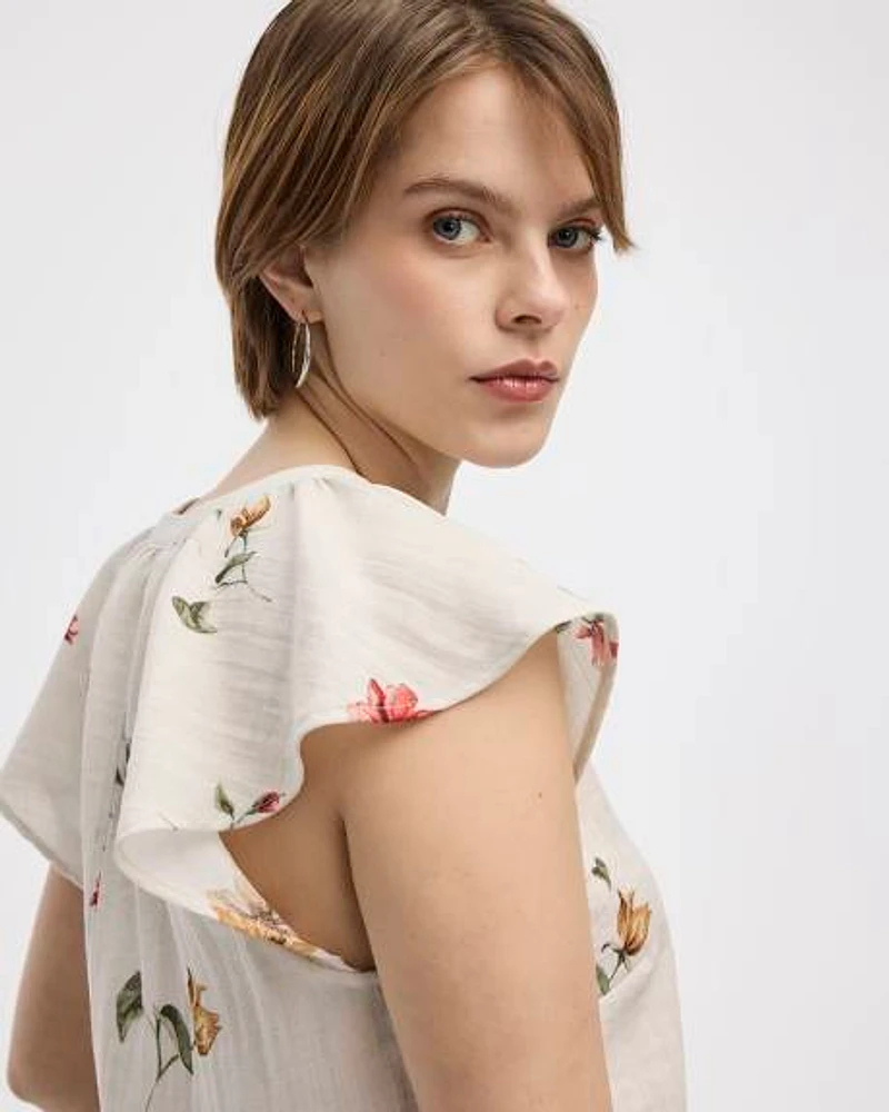 Blouse boutonnée à manches courtes volants et col fendu