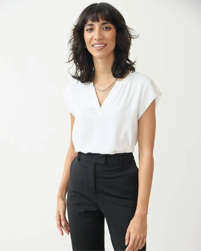 Blouse à manches très courtes et col fendu