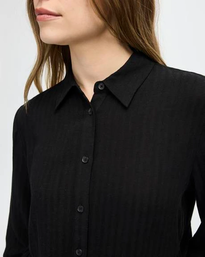 Blouse boutonnée péplum à manches longues