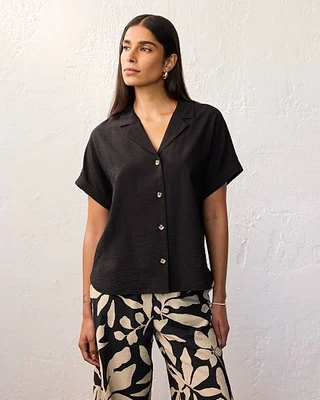 Blouse à manches courtes avec col revers cranté