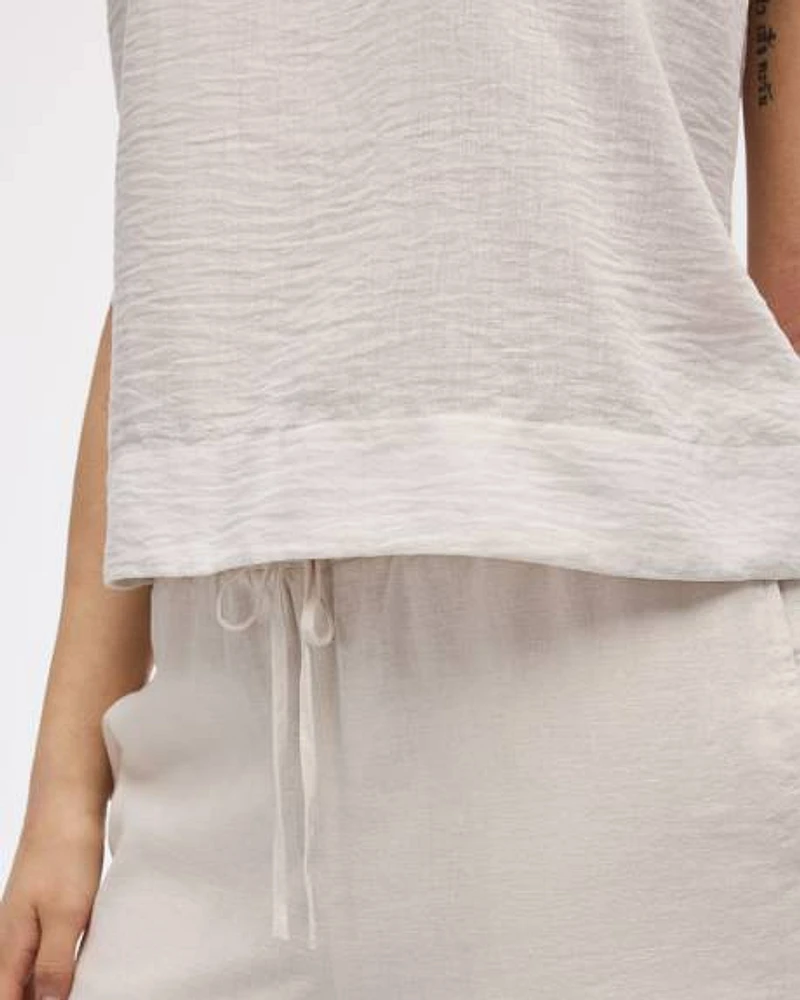 Blouse sans manches à col rond