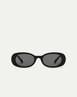 Lunettes de soleil noires à monture ovale