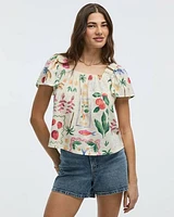 Blouse à col carré et manches courtes volants