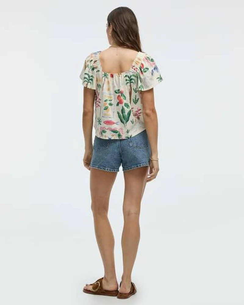 Blouse à col carré et manches courtes volants