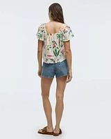 Blouse à col carré et manches courtes volants
