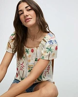 Blouse à col carré et manches courtes volants