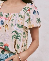 Blouse à col carré et manches courtes volants