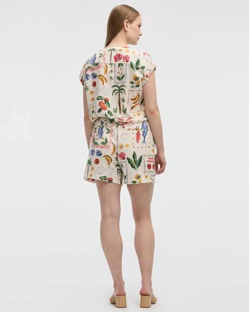 Blouse boutonnée à manches très courtes et col rond