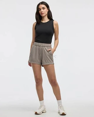 Short extensible à enfiler avec poches zippées