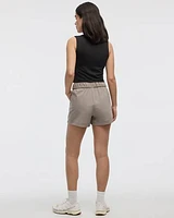 Short extensible à enfiler avec poches zippées
