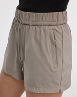 Short extensible à enfiler avec poches zippées
