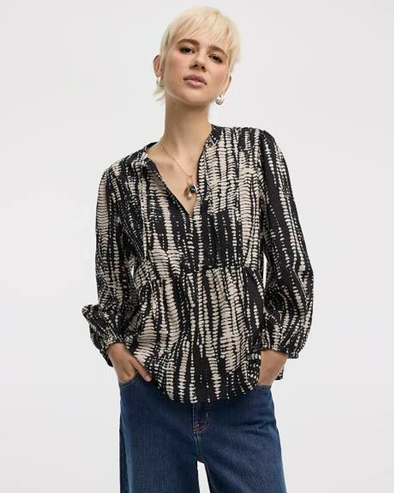 Blouse à col fendu et manches bouffantes