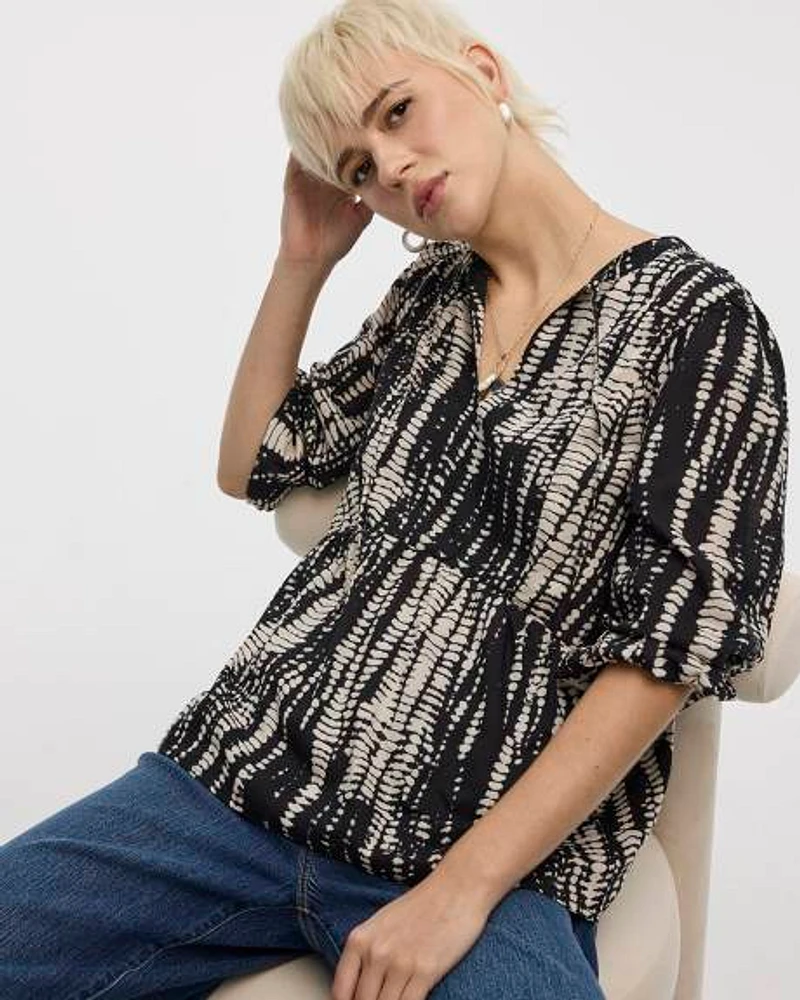 Blouse à col fendu et manches bouffantes