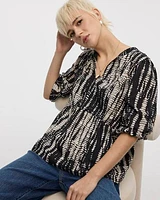 Blouse à col fendu et manches bouffantes