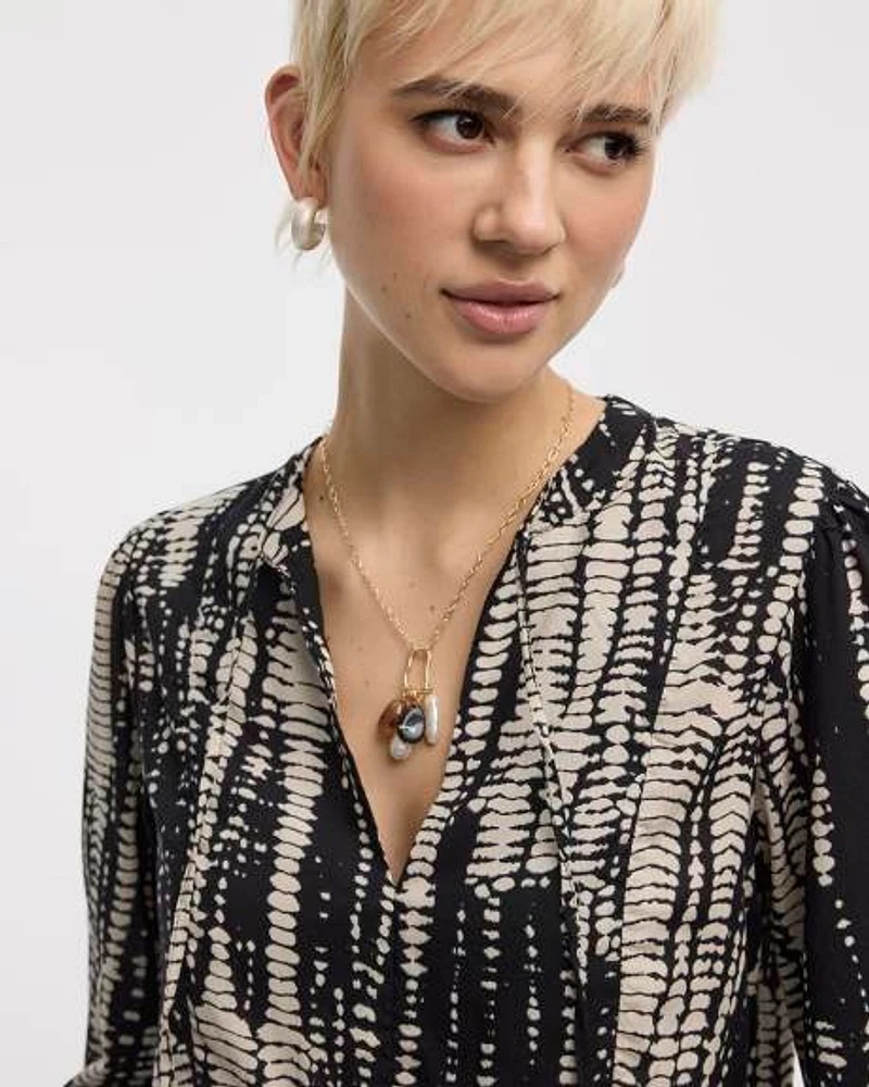 Blouse à col fendu et manches bouffantes