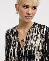 Blouse à col fendu et manches bouffantes
