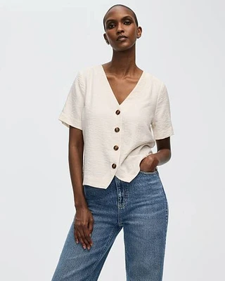 Blouse à boutonner manches courtes bouffantes et col V