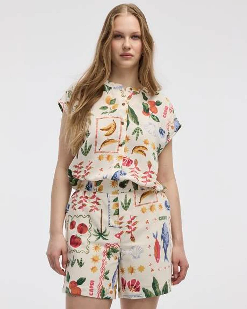 Blouse boutonnée à manches très courtes et col rond