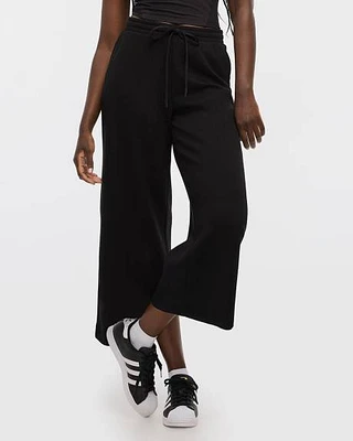 Pantalon court à jambe large en scuba