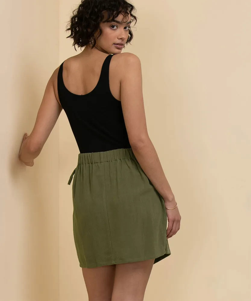 Meraki Asymmetric Hem Mini Wrap Skirt