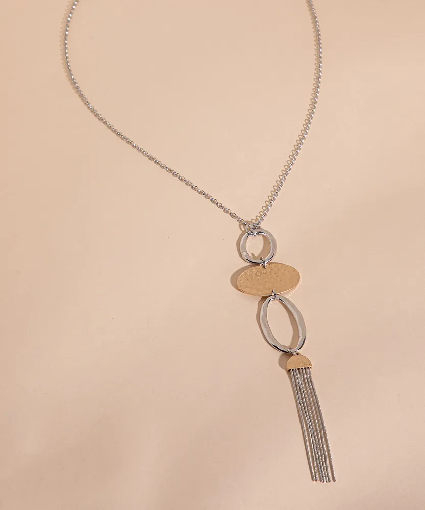 Long Hammered Metal Pendant with Tassel