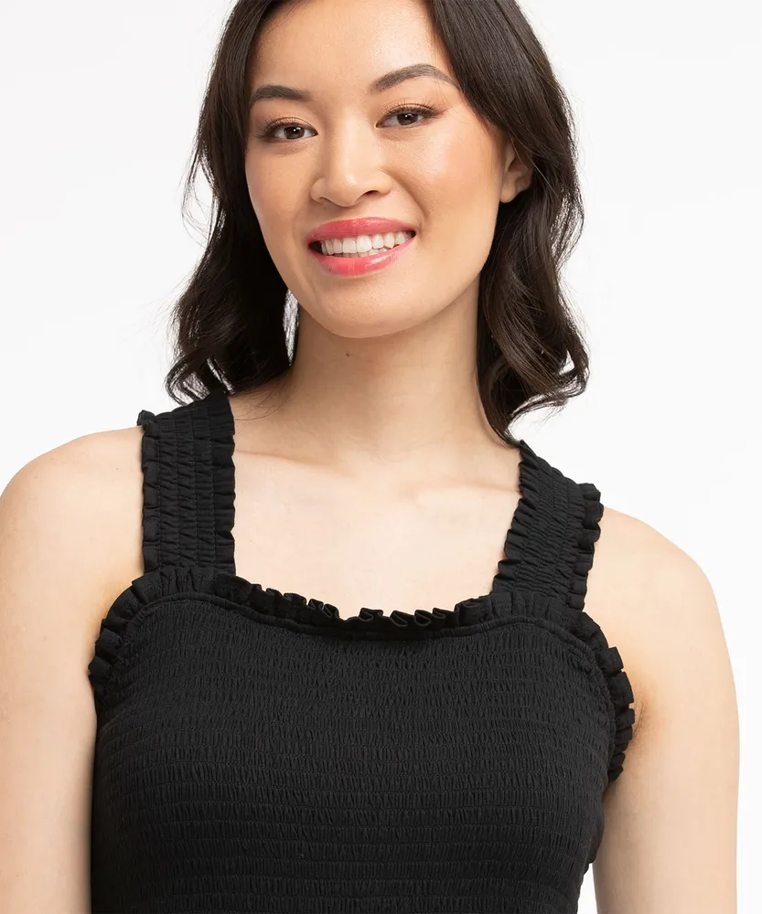 Eco-Friendly Smocked Sleeveless Peplum Top