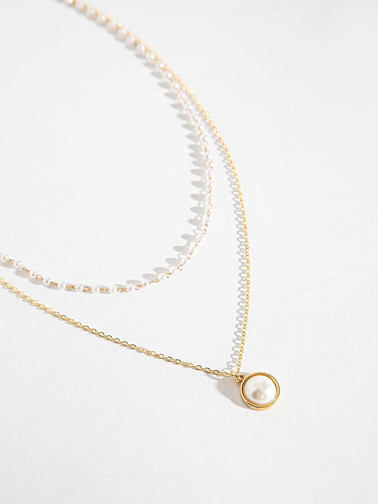 Layered Pearls & Solitaire Pendant Gold Necklace