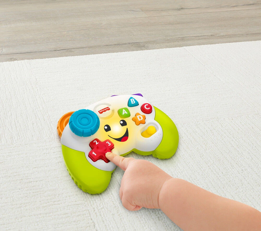 Fisher-Price  Rires et Éveil  Manette de jeu éducative, multilingue