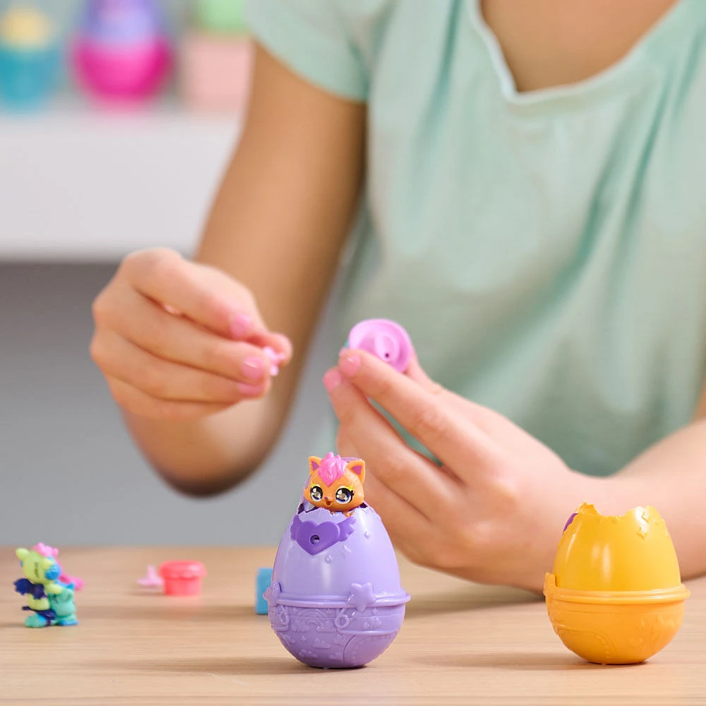 Hatchimals Alive, Boîte d'oeufs rose et jaune, jouet avec 6 mini figurines dans des oeufs qui éclosent tout seuls, 11 accessoires