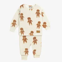 CREAM TWO-PIECES PAJAMA WITH AN ALL OVER PRINT OF GINGERMEN SOFT FLEECE, BABY