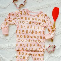 PINK TWO-PIECES PAJAMA WITH AN ALL OVER PRINT OF DELICIOUS COOKIES POLYESTER, BABY