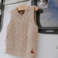 KNITTED CABLE SWEATER VEST