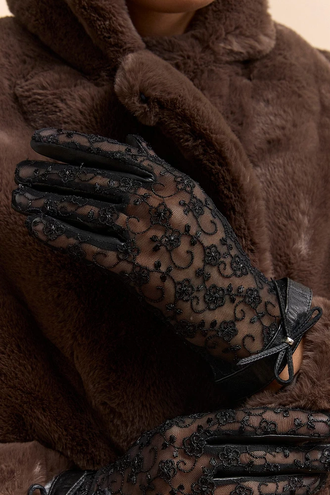 Lace and leather gloves