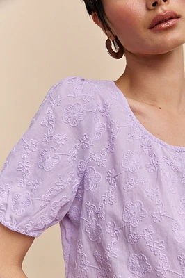 Blouse à manches bouffantes en broderie