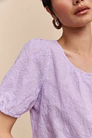 Blouse à manches bouffantes en broderie