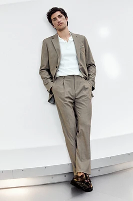 Pantalon texturé à plis