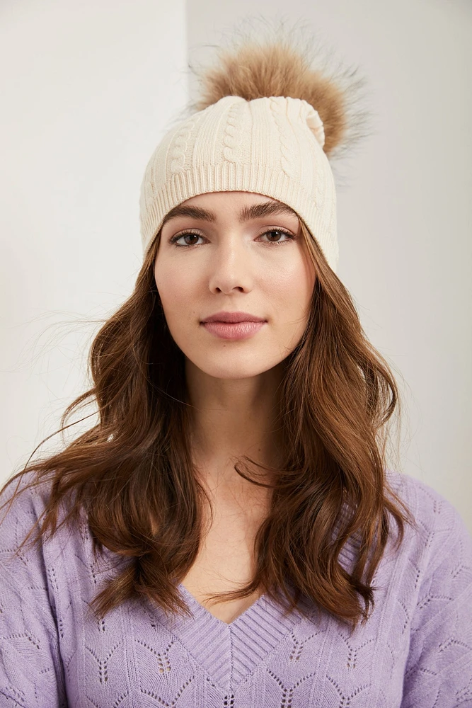 Hat with removable fur pompom