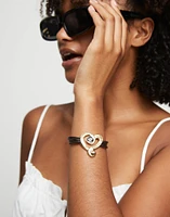 Multi strand leather bracelet with a heart