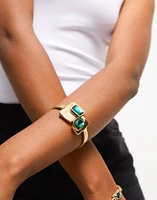 Bangle bracelet with green crystals