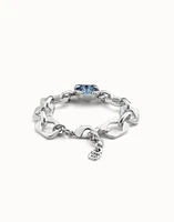Link chain bracelet with a blue crystal