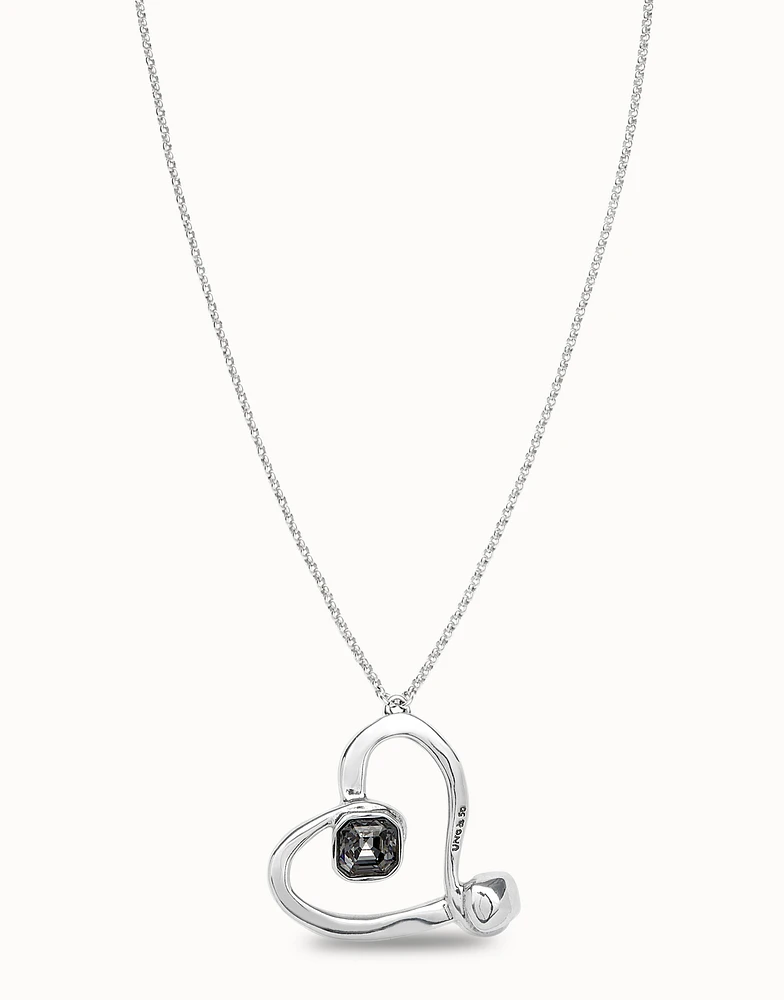 Long chain pendant necklace with a large heart