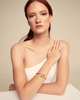 Bangle bracelet with inner spring