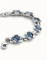 Link chain bracelet with a blue crystal