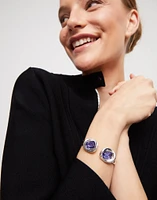 Bangle bracelet with two purple crystals